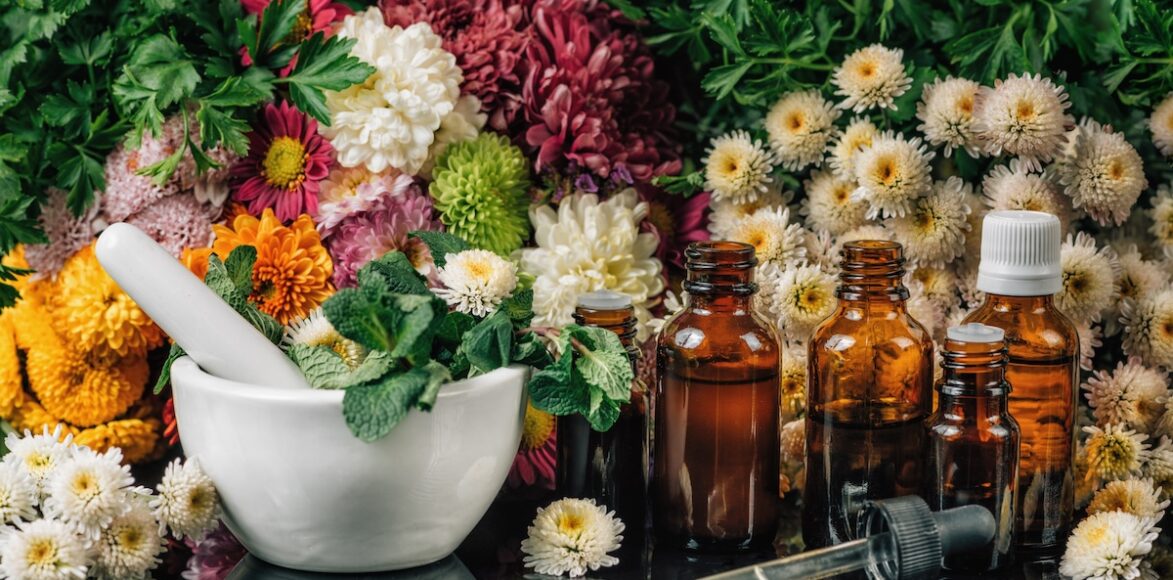 Bach Flower Remedies – Alternative Herbal Medicine Bach Flower Remedies - Alternative Herbal Medicine. Dropper bottles, flowers, and mortar and pestle full of fresh mint