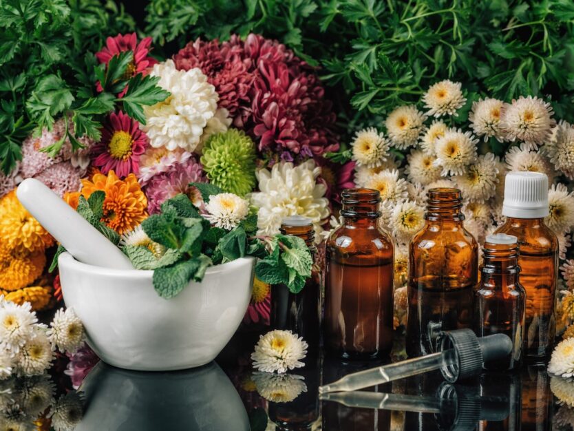 Bach Flower Remedies – Alternative Herbal Medicine Bach Flower Remedies - Alternative Herbal Medicine. Dropper bottles, flowers, and mortar and pestle full of fresh mint