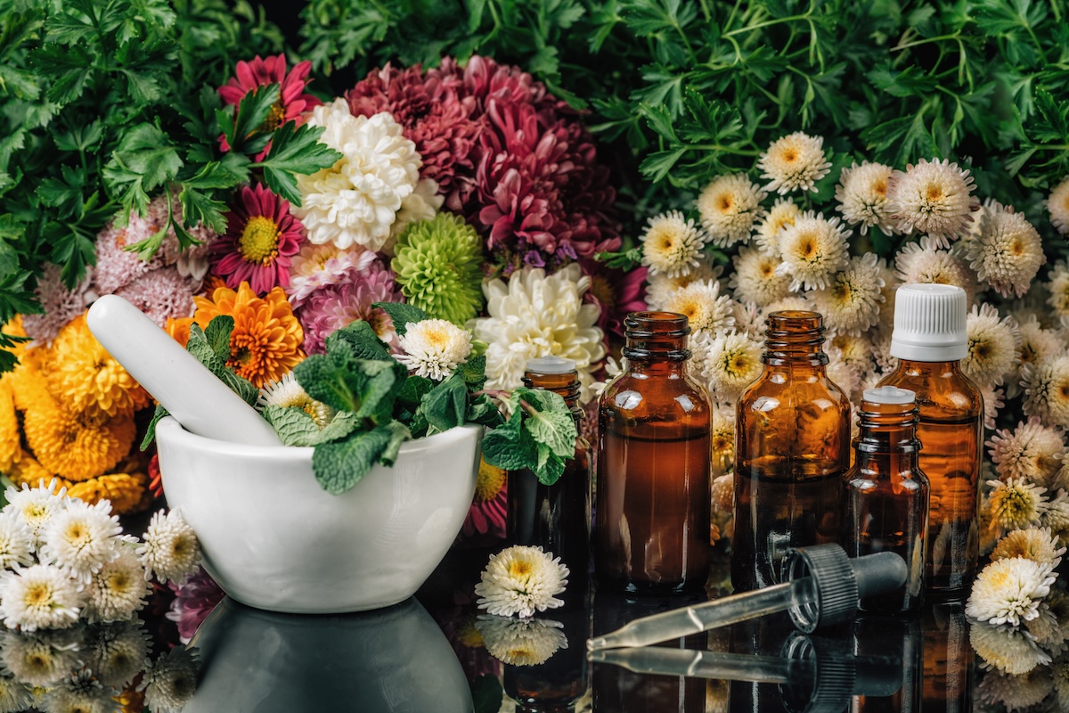 Bach Flower Remedies – Alternative Herbal Medicine Bach Flower Remedies - Alternative Herbal Medicine. Dropper bottles, flowers, and mortar and pestle full of fresh mint